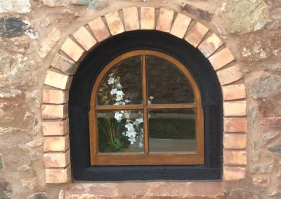 Building round window CE Keeble Ltd
